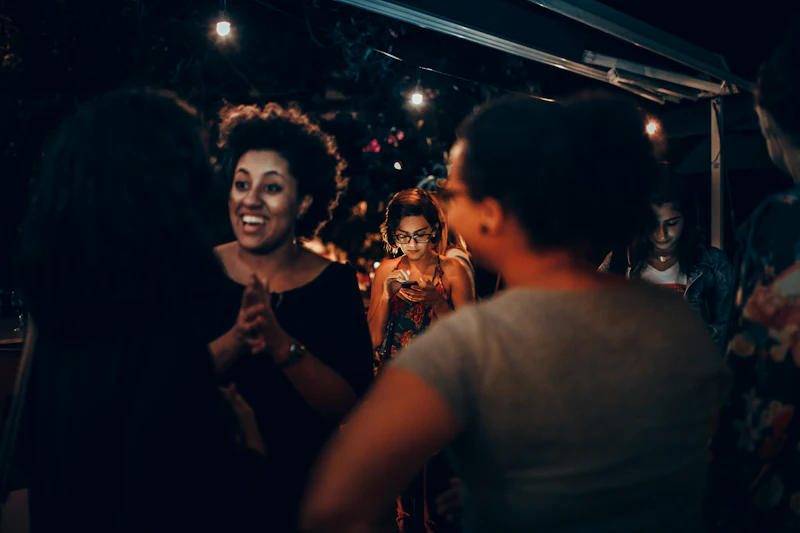 Friends laughing together at a party